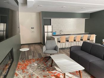 Community room with kitchen-lounge with fireplace